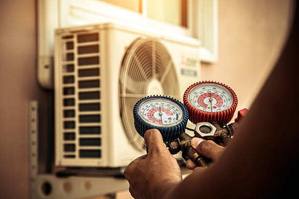 Professional Heat Pump Repair technician working in Drake, KY